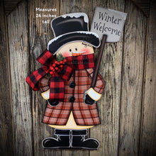 Load image into Gallery viewer, Snowman door hanger, Christmas door hanger, Winter porch decor, Wood Christmas decor, primitive snowman boots, snowman wreath for front door