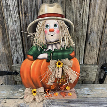 Load image into Gallery viewer, Scarecrow, Pumpkin centerpiece, Fall wood decor, Thanksgiving porch decor, Primitive Scarecrow on pumpkin sign, Fall arrangement, Halloween
