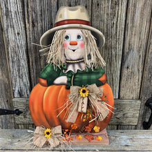 Load image into Gallery viewer, Scarecrow, Pumpkin centerpiece, Fall wood decor, Thanksgiving porch decor, Primitive Scarecrow on pumpkin sign, Fall arrangement, Halloween