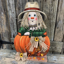 Load image into Gallery viewer, Scarecrow, Pumpkin centerpiece, Fall wood decor, Thanksgiving porch decor, Primitive Scarecrow on pumpkin sign, Fall arrangement, Halloween