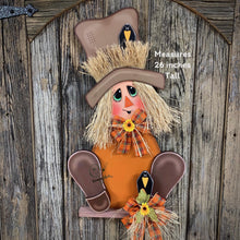 Load image into Gallery viewer, Fall door hanger, Scarecrow door decor, Scarecrow porch decor, Thanksgiving Door Hanger, Halloween door hanger, Sitting Scarecrow with hat