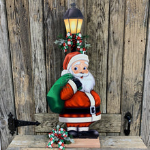 Load image into Gallery viewer, Santa Clause Decoration, Christmas centerpiece, Primitive Santa decor, Christmas Porch decor, Wooden Santa with North pole sign, Candy decor
