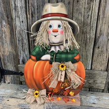 Load image into Gallery viewer, Scarecrow, Pumpkin centerpiece, Fall wood decor, Thanksgiving porch decor, Primitive Scarecrow on pumpkin sign, Fall arrangement, Halloween
