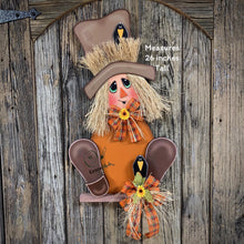Load image into Gallery viewer, Fall door hanger, Scarecrow door decor, Scarecrow porch decor, Thanksgiving Door Hanger, Halloween door hanger, Sitting Scarecrow with hat
